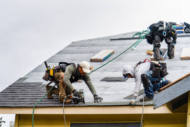 Professional Gutter Installation technician working in West Kingston, RI